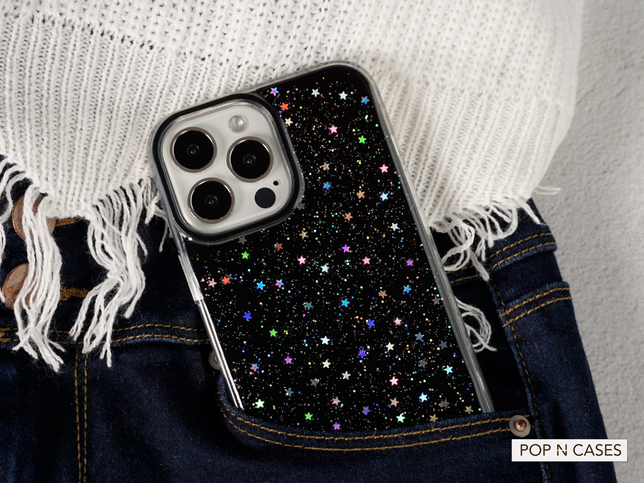 Glitter.iPhone.Case.With.Holographic.Iridescent.Stars.With.Stylish.Outfit.Trendy.Fashion.Jeans.White.Sweater.Fashion.Style.Company.Canada